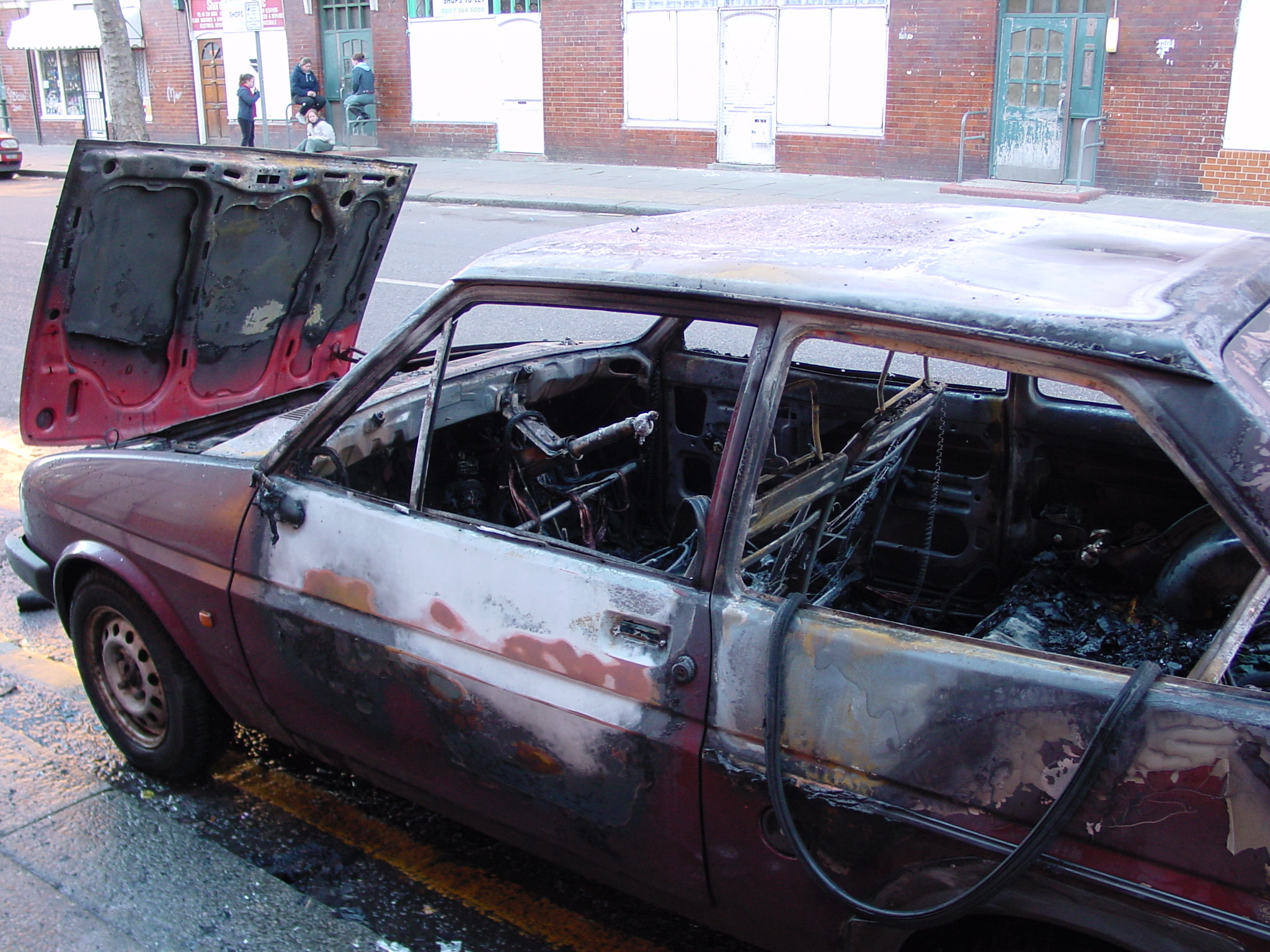 Burnt out car, Calvert Avenue, 1 Jan 2002